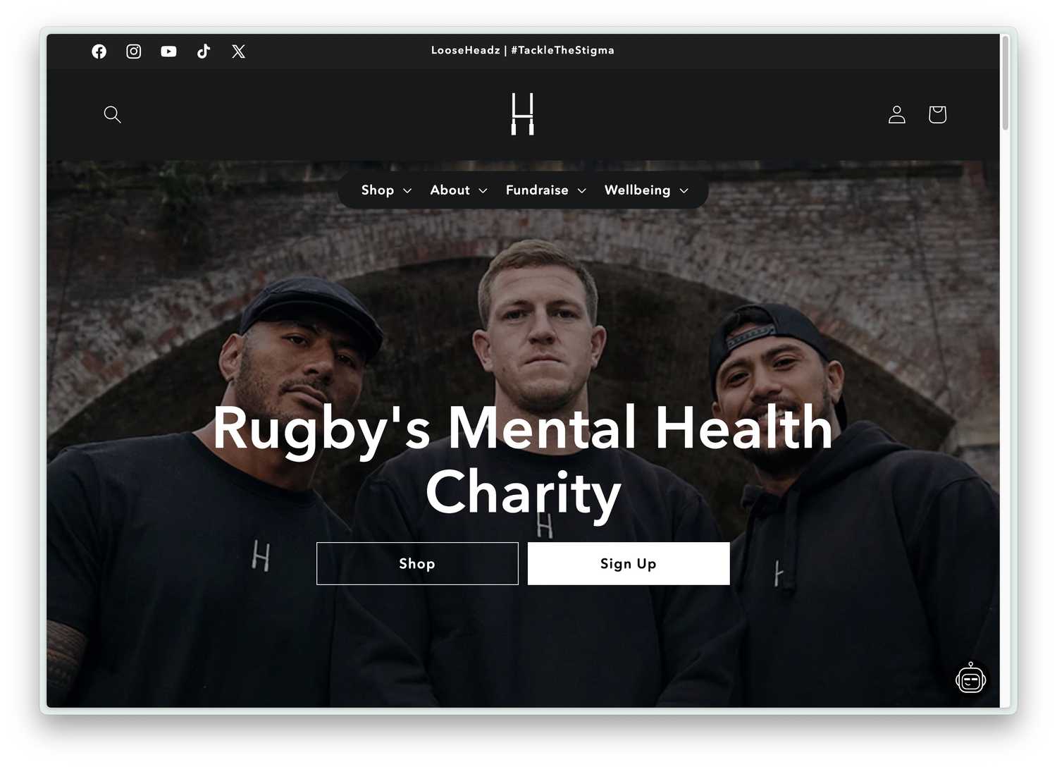 LooseHeadz homepage Shopify hero section featuring rugby players promoting mental health awareness through apparel sales